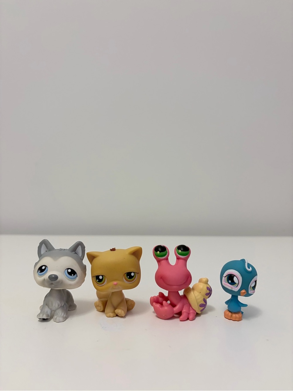 Littlest Pet Shop Mini Figures — Gray Husky, Tan Cat, Pink Snail, Blue Bird